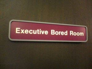 funny-sign-executive-bored-room
